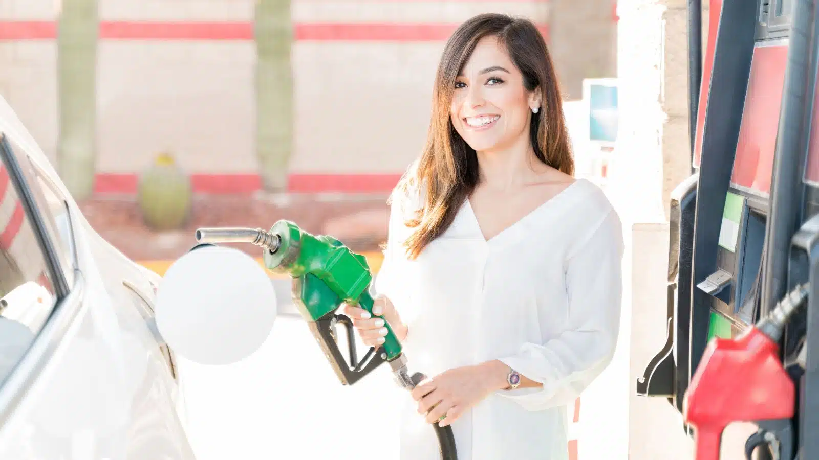 woman at gas station Adobe Stock