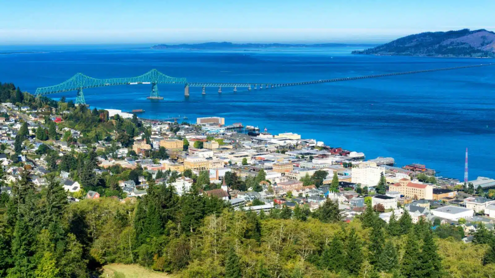 Astoria, Oregon, the first permanent U.S. settlement on the Pacific coast, overlooks the Astoria Megler bridge as it crosses the Columbia river to the state of Washington.