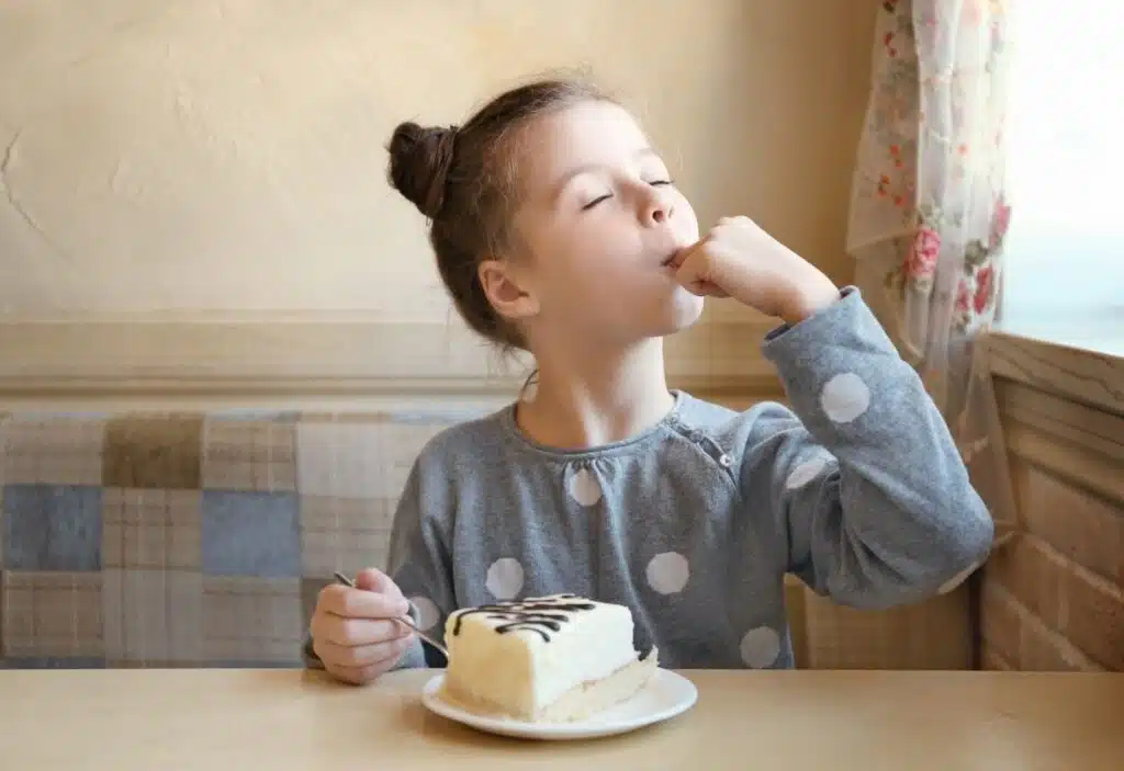 Child eating dessert Depositphotos 138412196 XL
