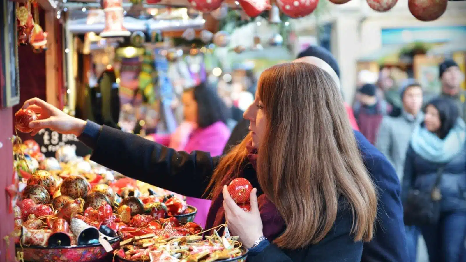 Woman buying Christmas decoration