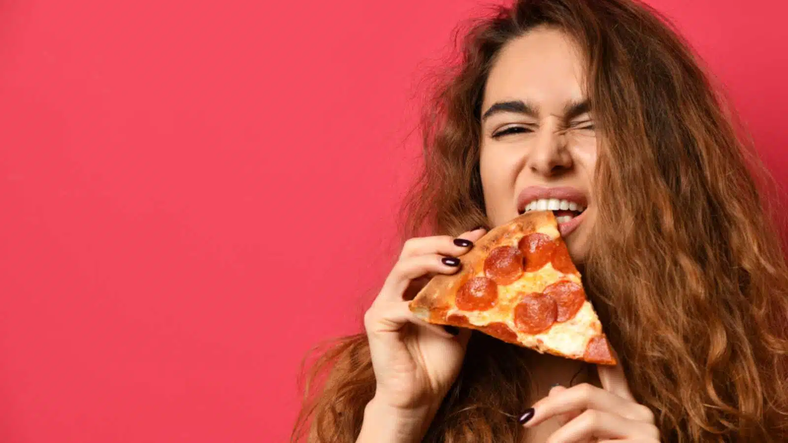 Woman eating Pizza