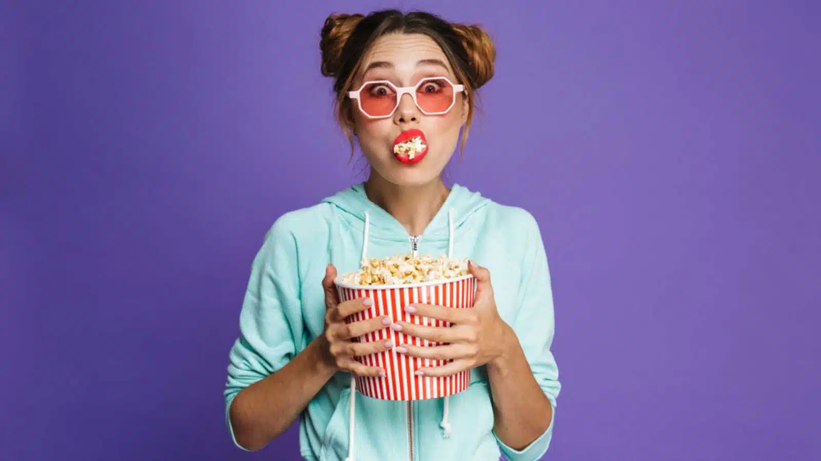 Woman eating Popcorn