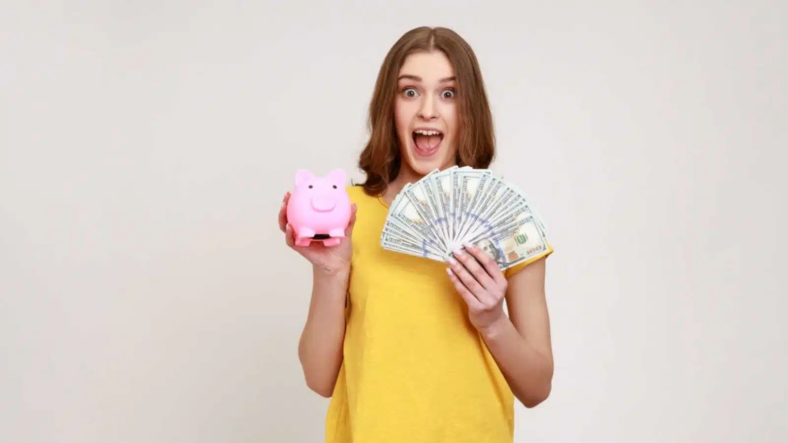 Woman with cash making savings