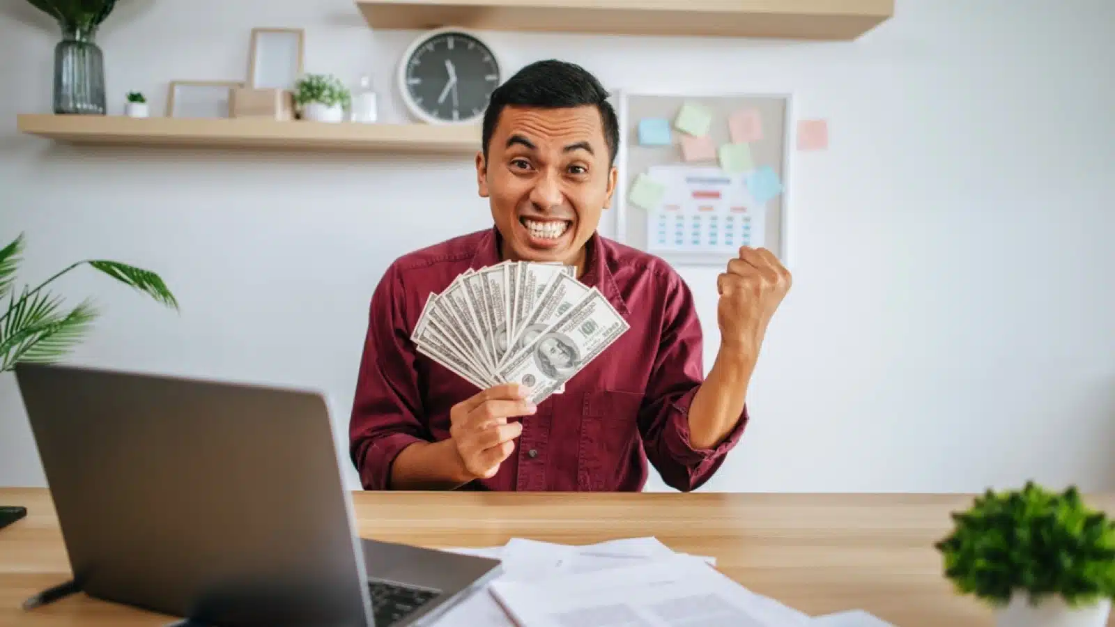 Man excited with money