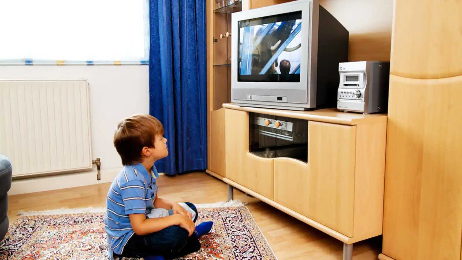 Kid watching cable TV
