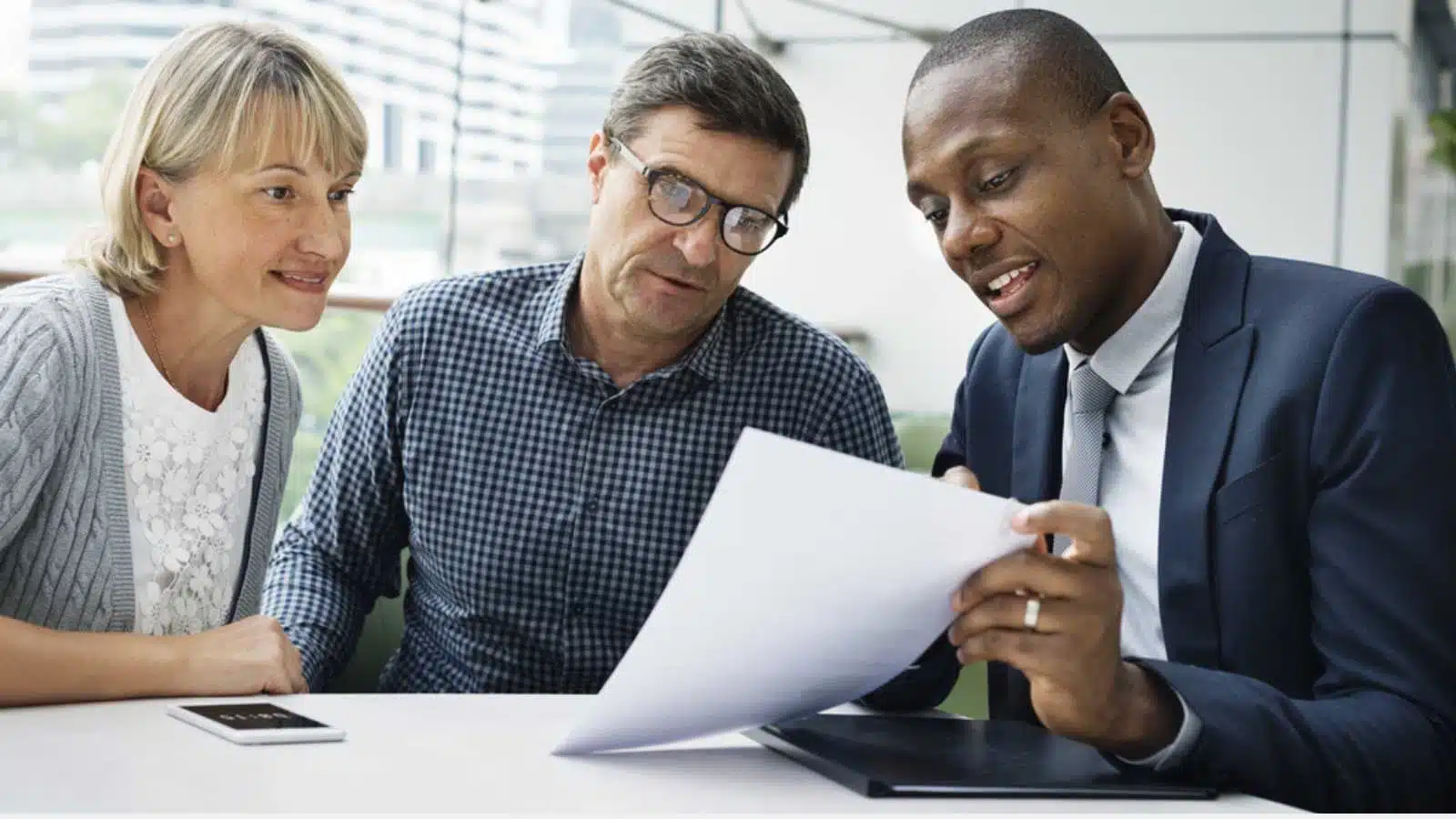 12 Things To Consider Before Moving Abroad After Retirement 11 Old couples discussing with officer
