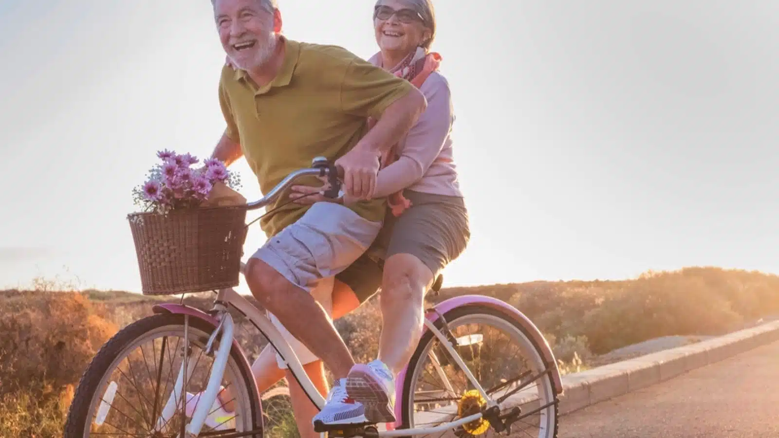 Old couples enjoying in bicycle